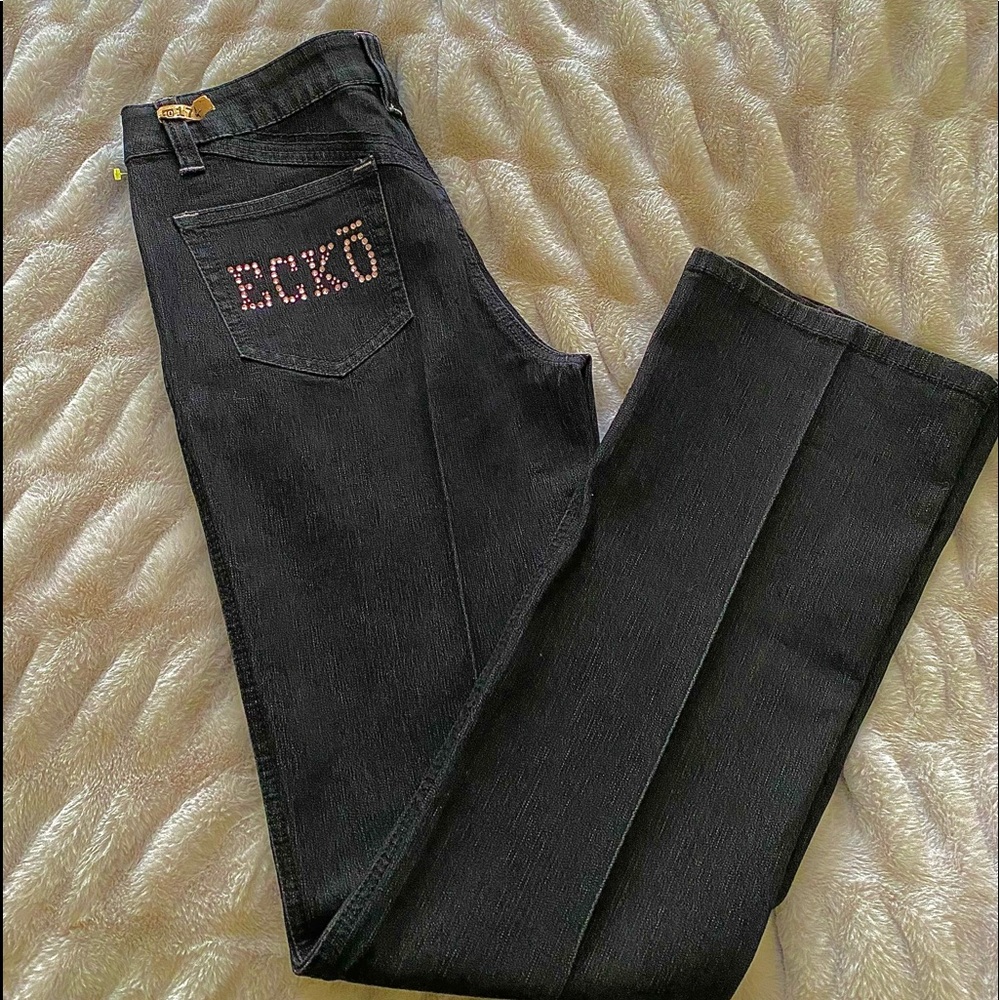 Low Rise Jeans with flare bottoms,pink studs on the back pockets “ECKO”and“RED”